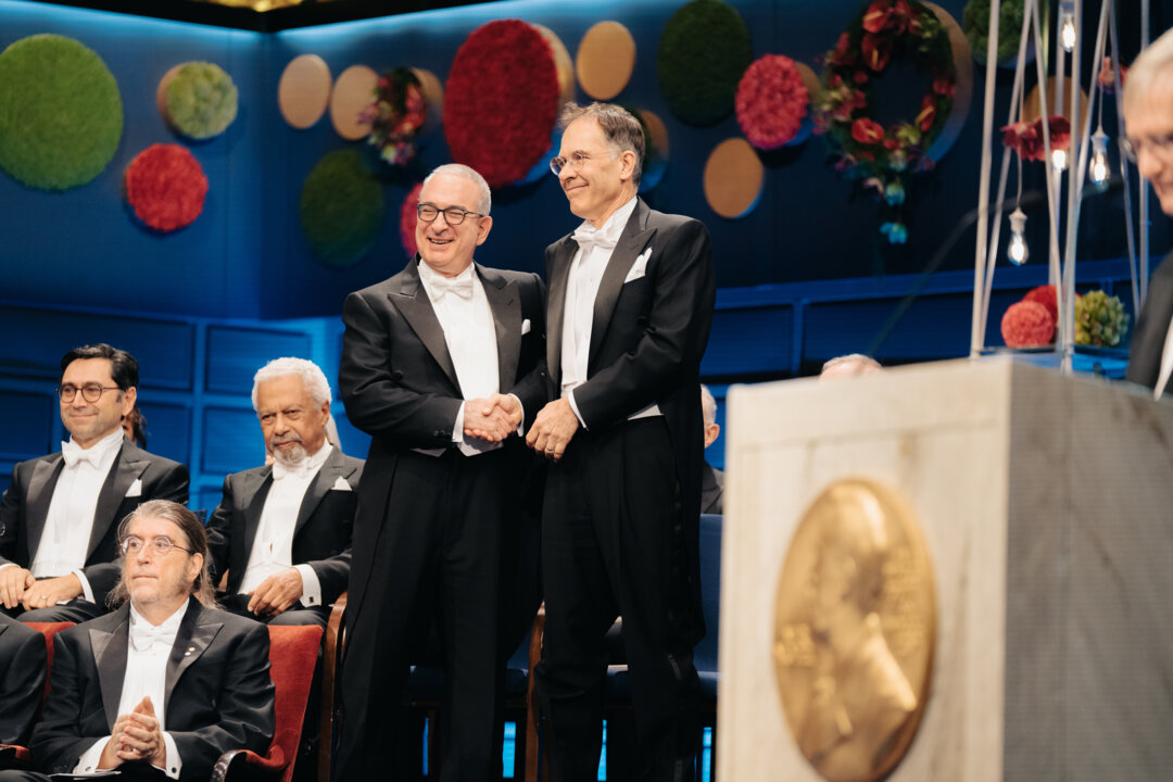 Joshua D. Angrist and Guido W. Imbens at the Nobel Prize award ceremony
